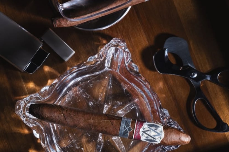 cigar cutter, cigar torch lighter, and cigars